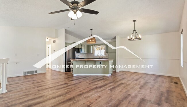 Building Photo - Updated 4 Bed, 2 Bath Home in Briargate with Mountain Views, fully fenced yard, 2 car garage and AC