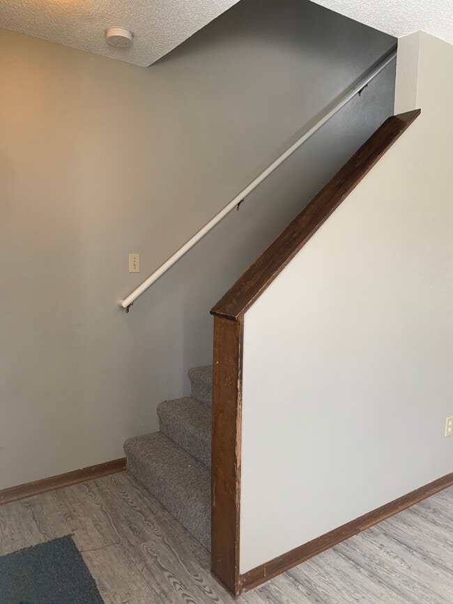 Stairs to upstairs - 2454 Indianola Ave