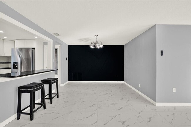 Building Photo - 7902 Canna Dr