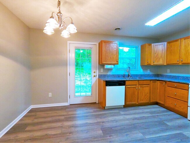 Building Photo - FOUNTAIN CITY: GROUND LEVEL 2 BEDROOM, 2 BATHROOM CONDO IN MAPLE CHASE