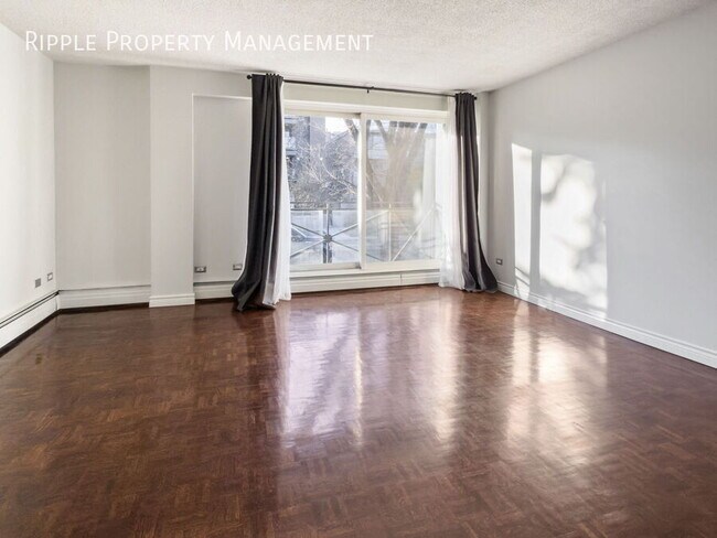 Photo du bâtiment - AMAZING 1 BED/ 1 BATH CONDO