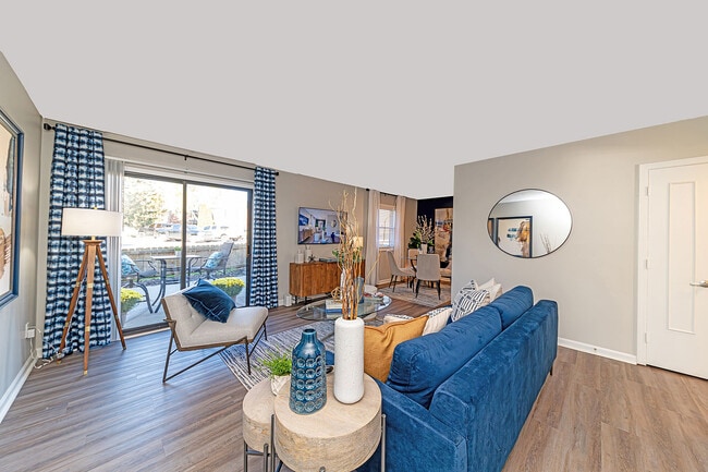 Spacious living room with hardwood-style flooring - The Fairways at Valle Vista