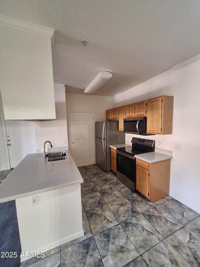 Foto del edificio - 5401 E Van Buren St