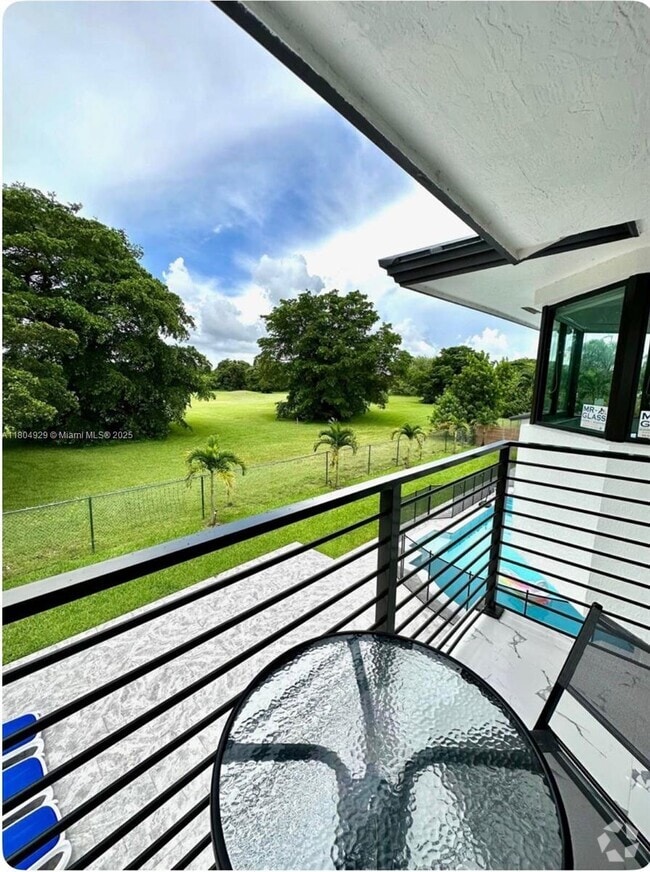 Building Photo - 9410 E Calusa Club Dr