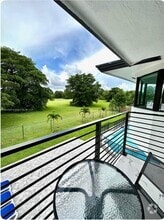 Building Photo - 9410 E Calusa Club Dr