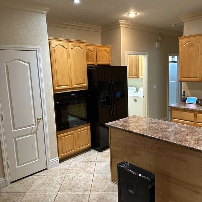 Building Photo - Spacious 4-Bedroom Retreat with Poolside O...