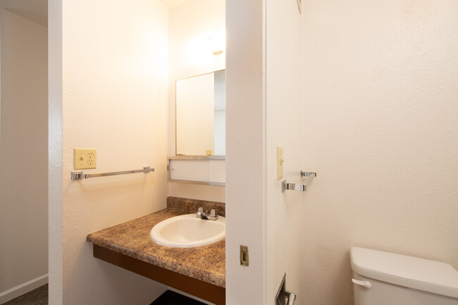 Vanity & Toilet - Woodridge Apartments