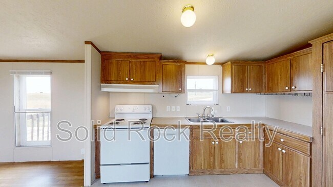 Building Photo - 9835 N Log Rd