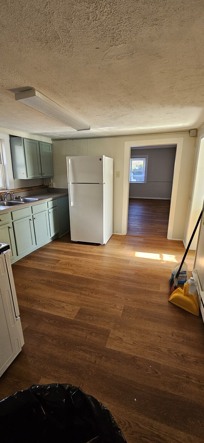 Kitchen remodeled in 2024 with new flooring installed - 3643 keezletown road