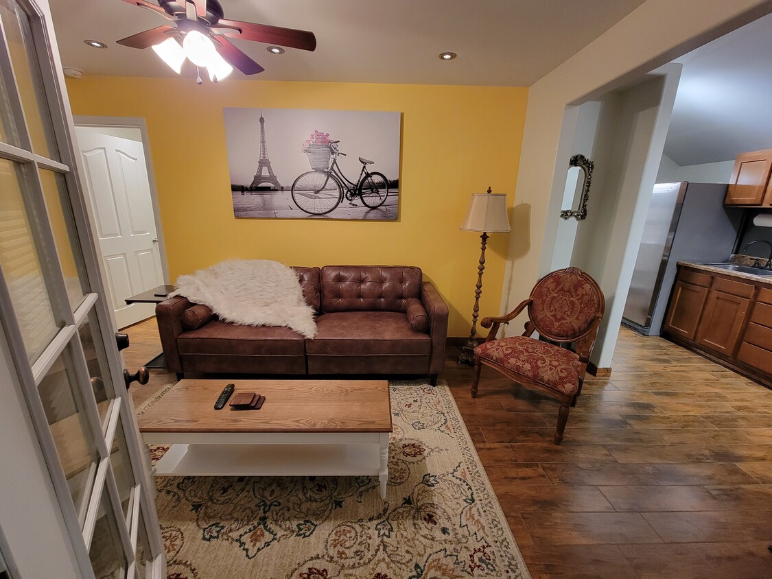 View of the living room as you step into the casita. - 1519 5th St NW