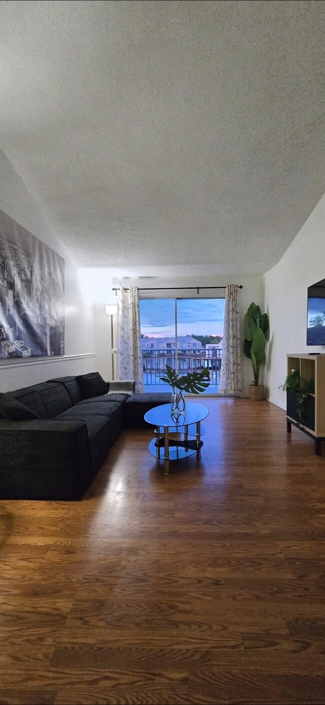 Living room with lake view - 2564 Woodgate Blvd