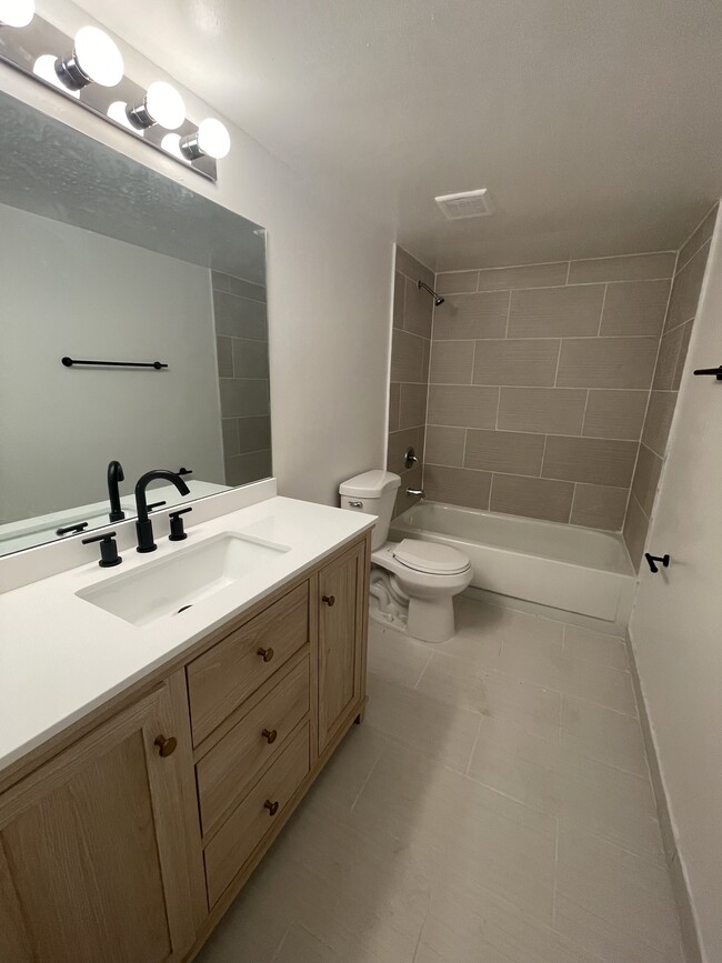 2 Bedroom Bathroom, renovated - Palm Court Apartments