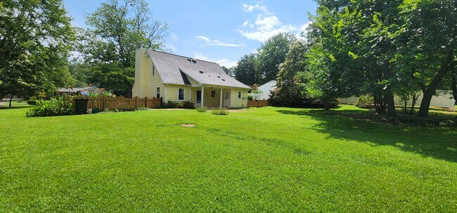 Home from the back - large open yard for relaxing - 209 Seasons Dr
