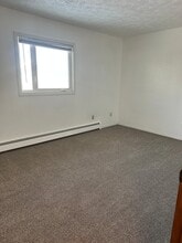 Building Photo - 2301 E 68th Ave