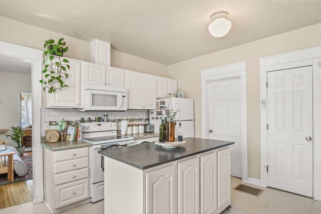 kitchen- island not part of space - 2706 Center Ave
