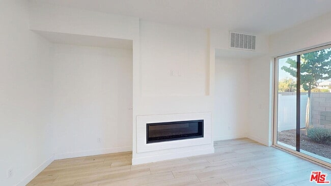 Building Photo - 8474 N. Camelia Court