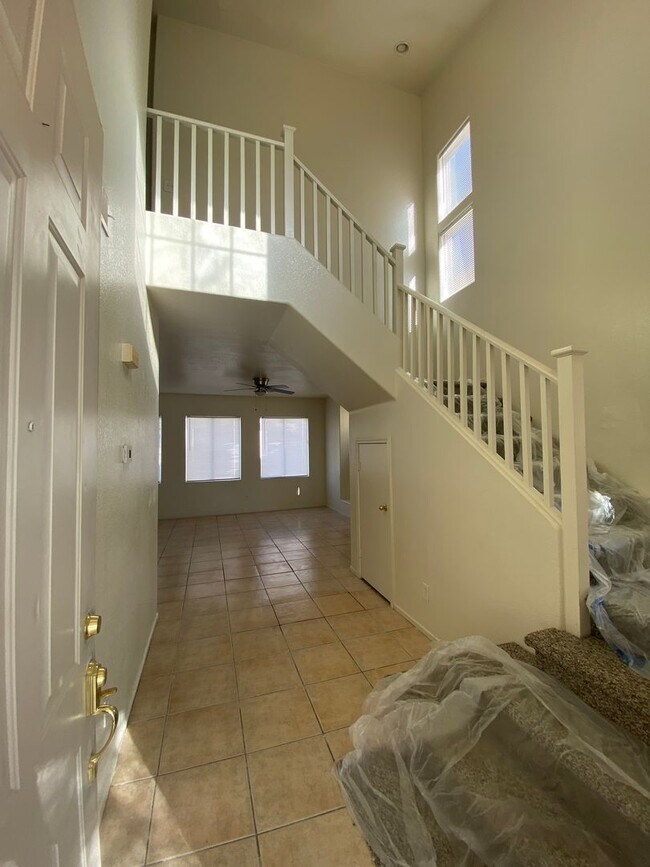Building Photo - AMERICANA Property Mgmt - Spacious 4 beds, 2 story home in gated community in NLV near Aliante.