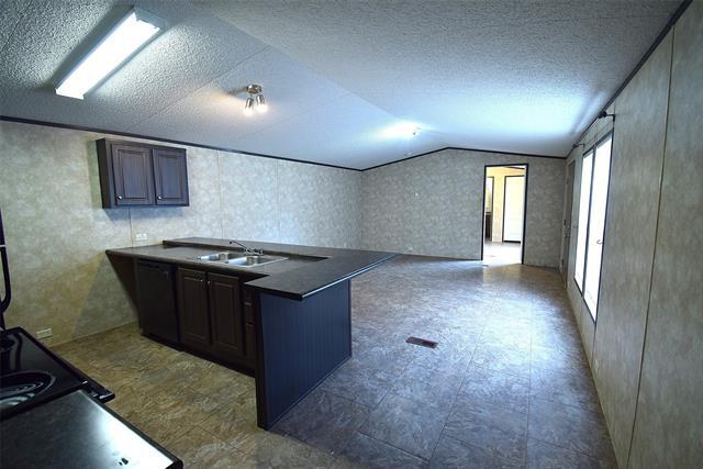 Foto del edificio - 6000 Spring Creek Pkwy