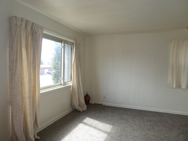 living room front window - 708 W 1st Ave