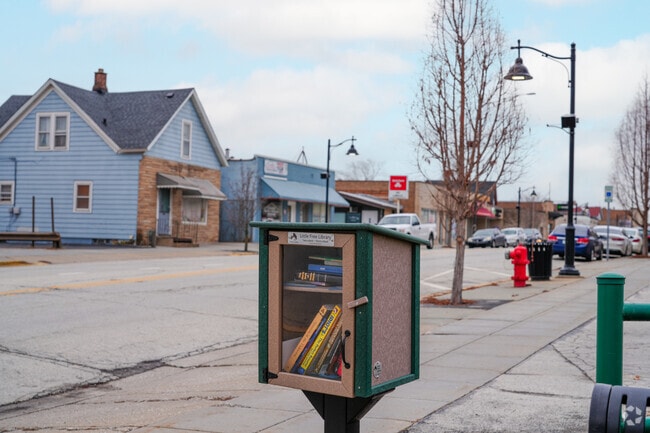 Enjoy a donated book from the local little lending library in downtown Lansing.