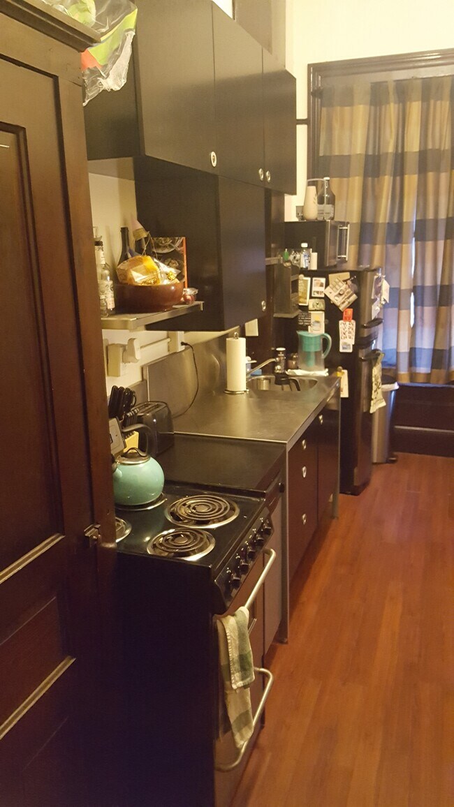 Kitchen at Stove - 1737 E Carson St