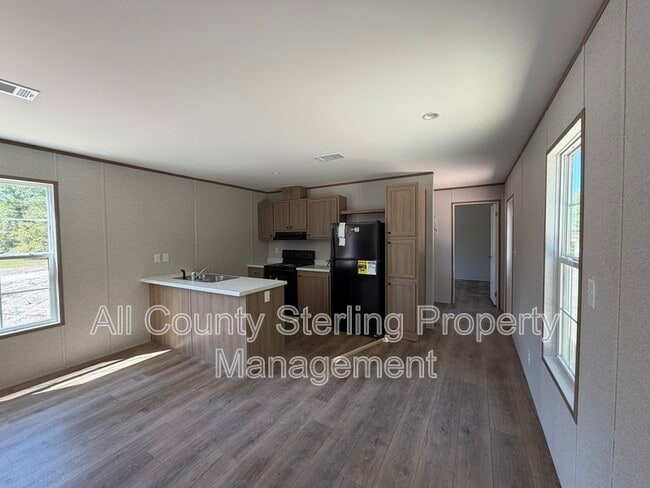 Building Photo - 129 SE Perfect Ct