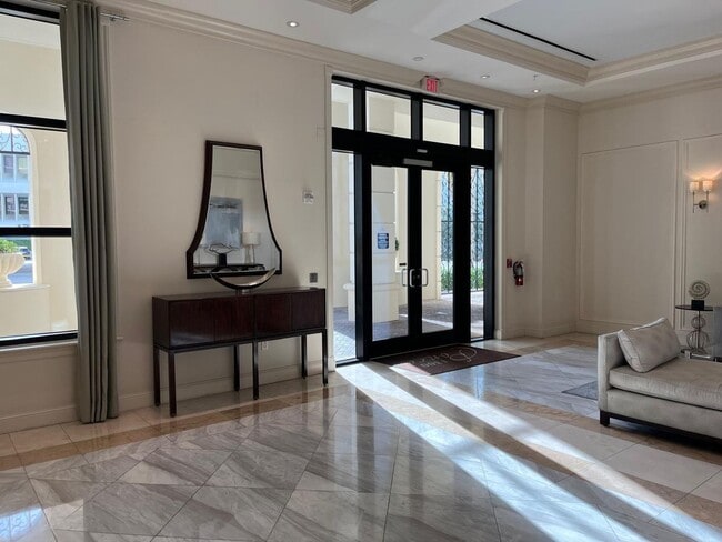 Building Photo - Modern 1BR/1BA Condo with 2 Parking Spaces – Prime Coral Gables Location