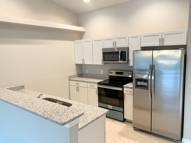 Foto del edificio - Like New DUPLEX 3 bedroom, 2 bath, 1 car g...