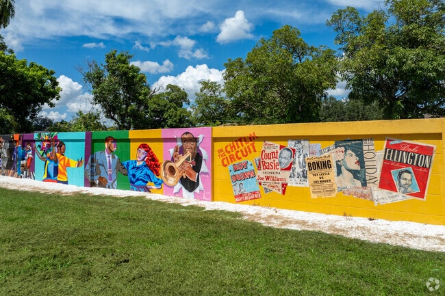 The iconic mural wall in East Fort Myers displays bits of Fort Myers history in a colorful way.