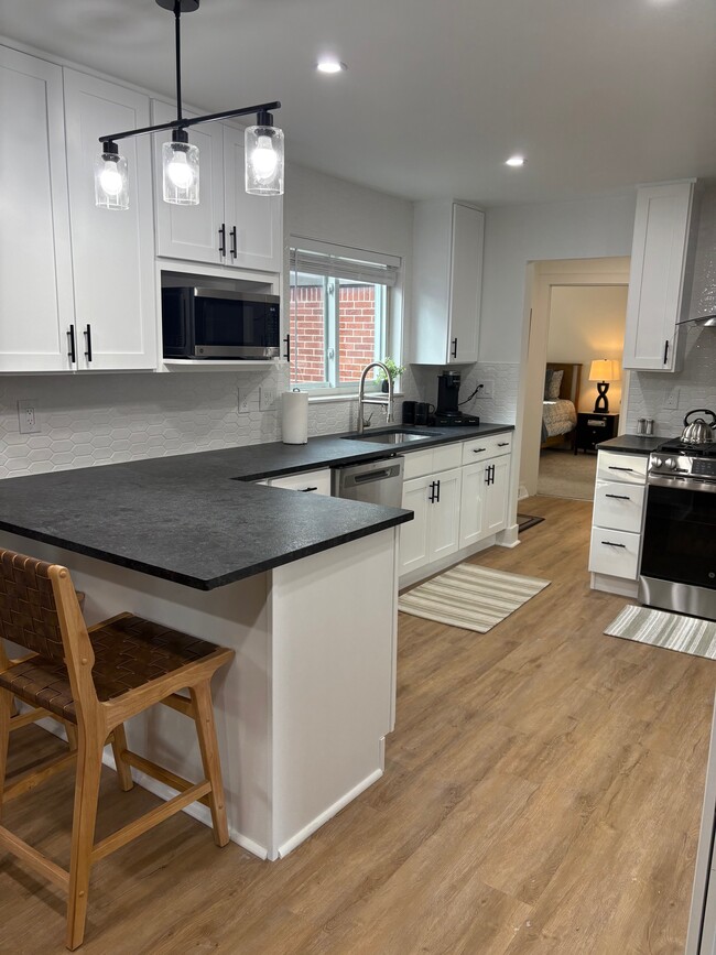 Brand New Kitchen with Peninsula for Extra Dining - 3527 Hillside Dr
