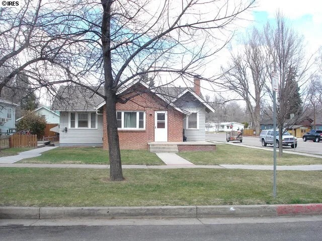 Front of home, entry to left - 338 E Pitkin St