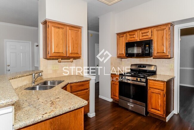 Building Photo - JUST REDUCED-Spacious 4 bedroom home in Ho...