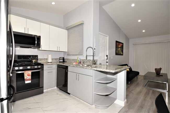 Building Photo - 5415 W Harmon Ave