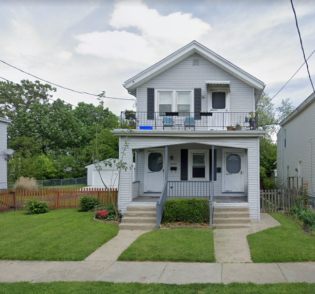 Outside view of the property with unit 1 on the left and 2 on the right - 5122 Hunter Ave