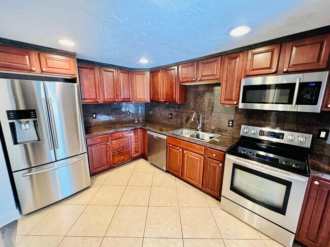 Building Photo - UNIVERSITY HILLS, CHARMING RANCH HOME, UPDATES THROUGHOUT, 3 BED, LARGE YARD, DECK AND PERGOLA .