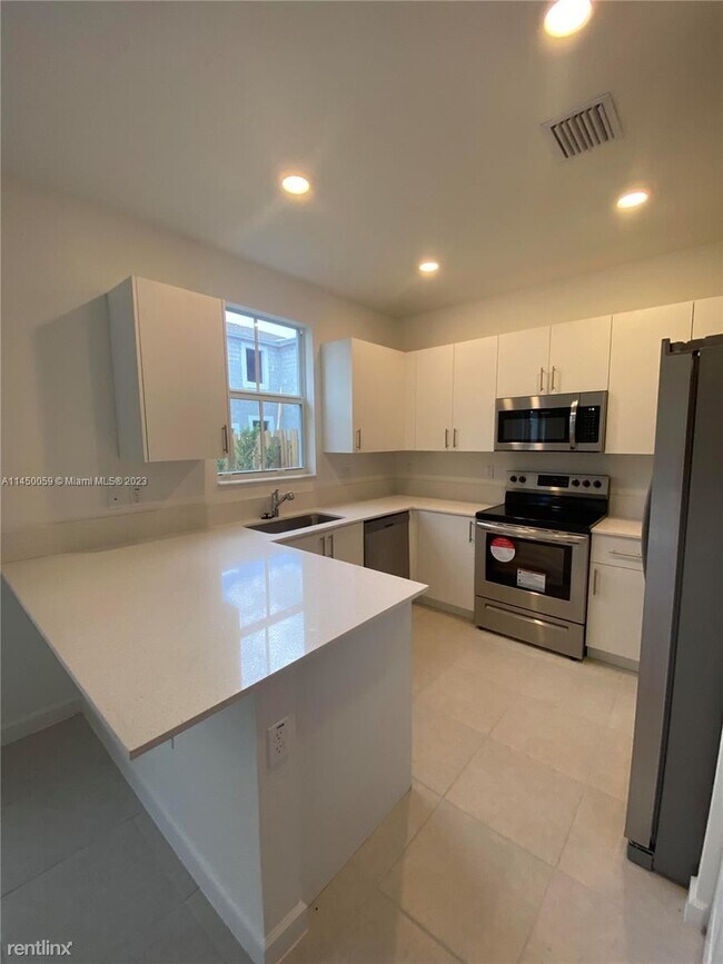 Building Photo - 3 br, 2.5 bath House - 11964 NW 47th Street 1