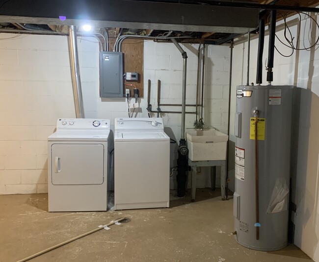 Free washer/dryer in each unit. Large clean basement. Each unit has it's own water heater, furnace and AC. - 1320 5th St W