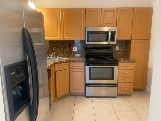 Foto del edificio - 3884 Coral Tree Cir