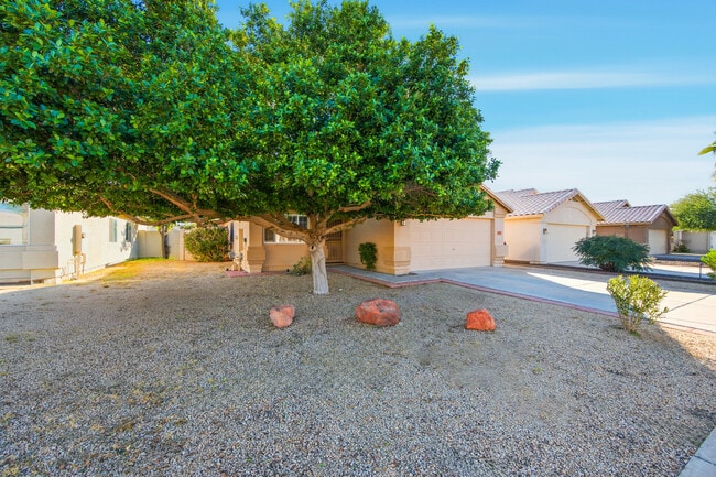 Building Photo - 7319 W Eugie Ave