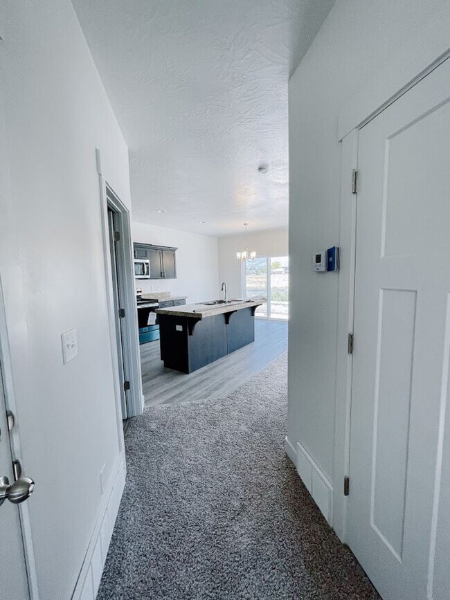 Building Photo - Brand New Idyllic END Unit Townhome in AF