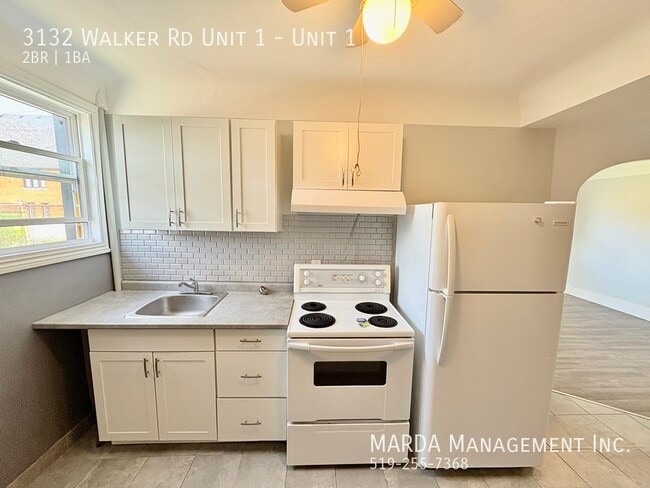 Building Photo - COZY 2 BEDROOM 1 BATH MAIN FLOOR UNIT - WALKER RD + HYDRO!