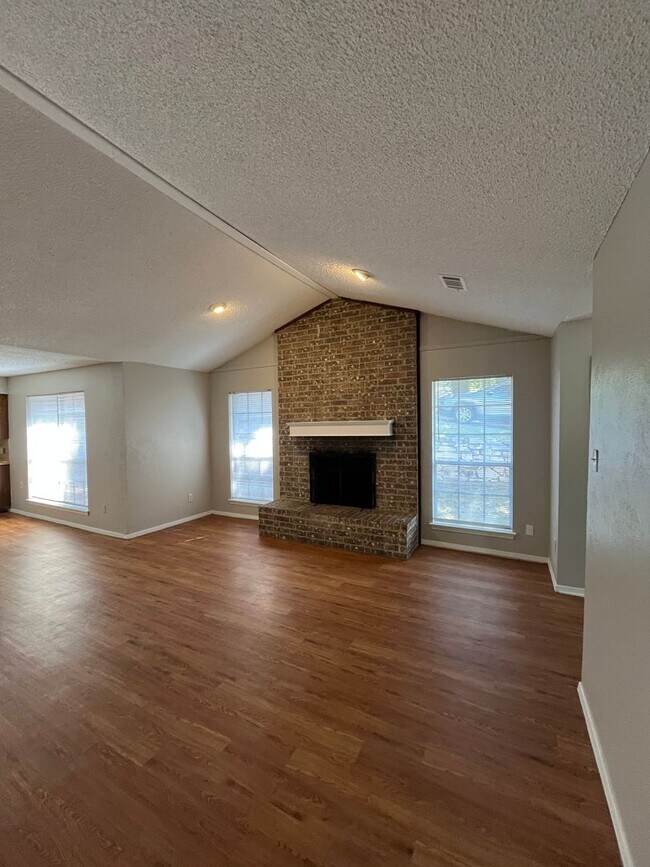 Photo - Spacious 3-Bedroom Duplex with Covered Parking & Fenced Yard! House