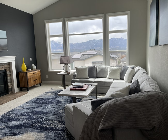 Living room- extra comfy sectional has double-sized hide-a-bed for guests. - 1410 Promontory Bluff Vw