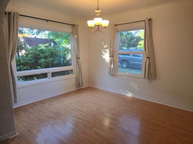 Building Photo - Three Bedroom with Fenced Backyard and Shed
