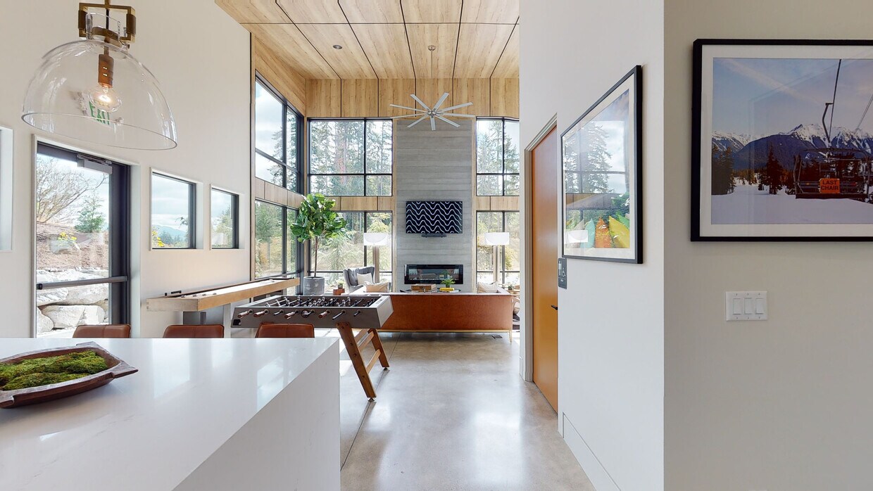 https://images1.apartments.com/i2/8GU2PrTiNKzCUYm5iIcKcCpeUUIeVmzq8MxDq49GVMs/111/marquee-living-maple-valley-wa-lounge.jpg