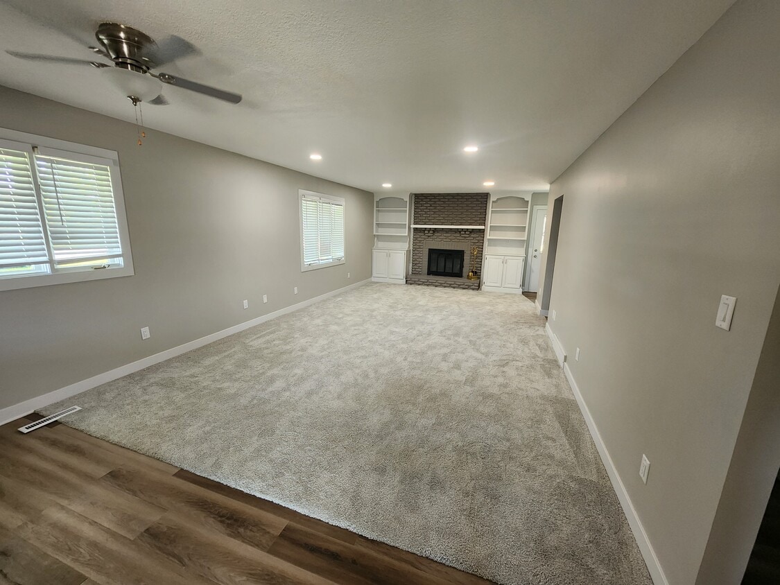 Living room with fire place - 4660 NW 62nd Ave