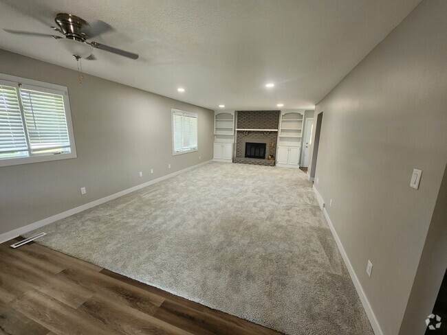 Living room with fire place - 4660 NW 62nd Ave