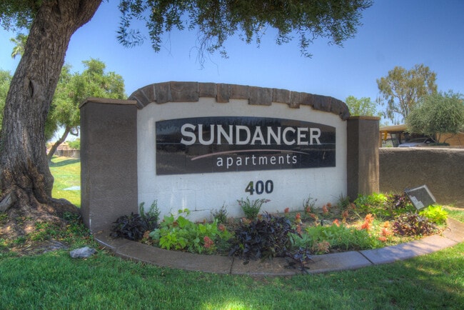 Sundancer Sign - Sundancer Apartments