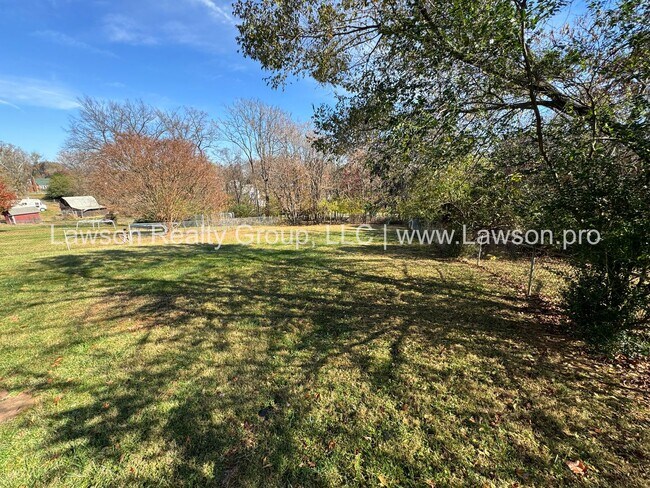 Building Photo - Solid Brick Ranch with Fenced in Yard