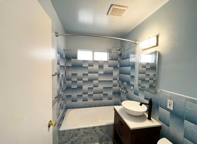 Bathroom with garden tub and modern fixtures - 11538 Eucalyptus Ave